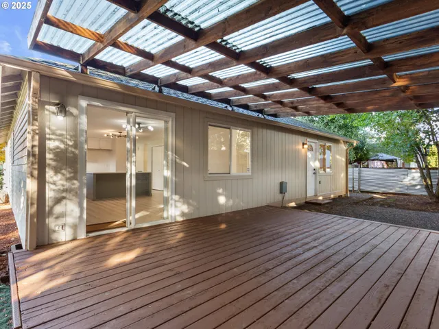 a view of backyard and tree