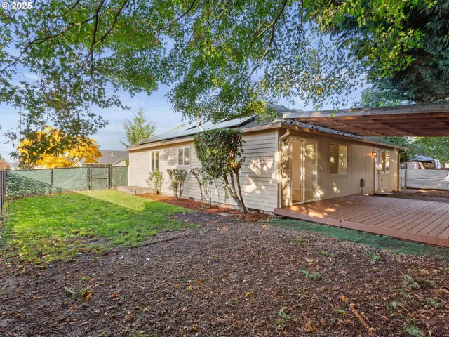 a backyard of a house with lots of green space