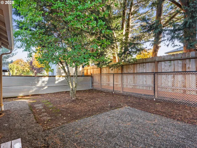 a house view with a backyard space