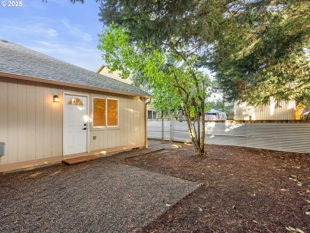 a view of backyard with green space