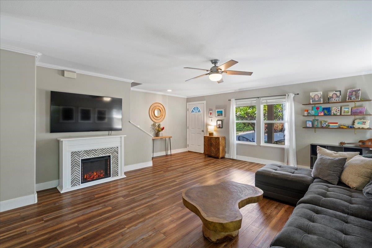 2740 Liholani Street, Unit 10 Pukalani, HI 96768 - Photo 14 of 50 a living room with furniture fireplace and flat screen tv