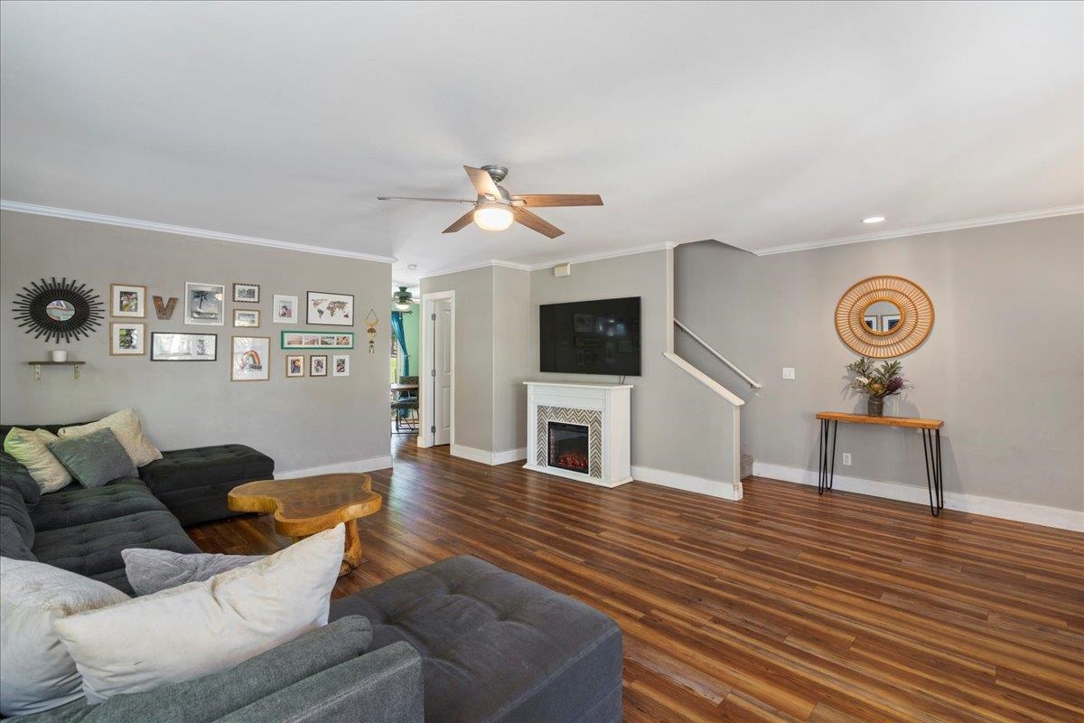 2740 Liholani Street, Unit 10 Pukalani, HI 96768 - Photo 15 of 50 a living room with furniture and a wooden floor