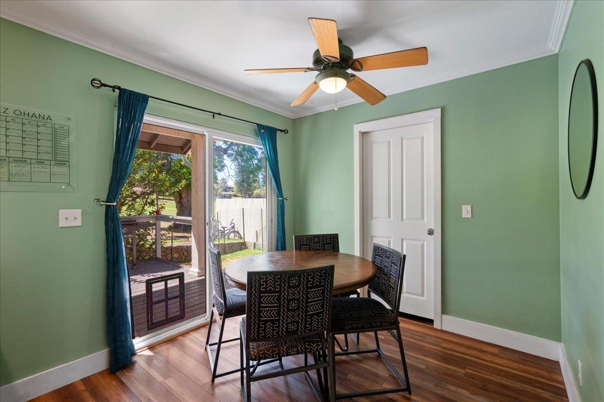 2740 Liholani Street, Unit 10 Pukalani, HI 96768 - Photo 25 of 50 a view of a dining room with furniture window and wooden floor