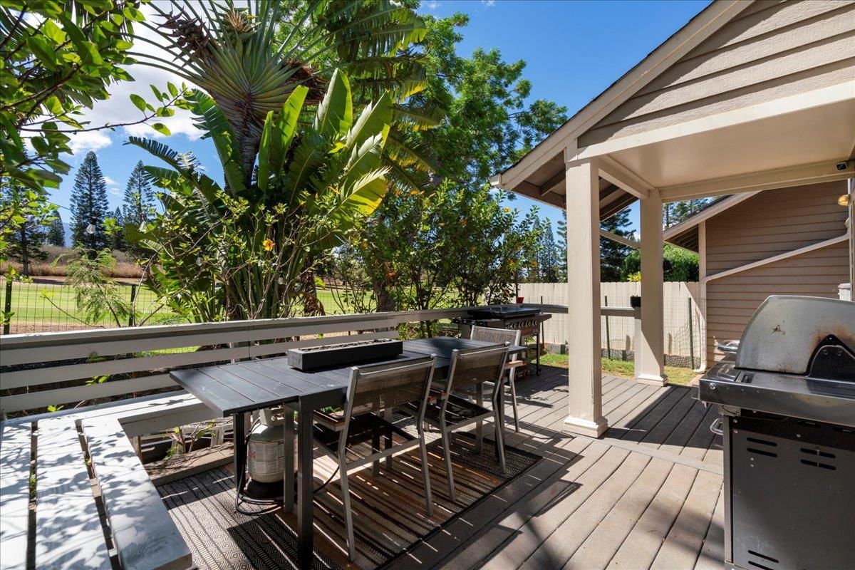 2740 Liholani Street, Unit 10 Pukalani, HI 96768 - Photo 31 of 50 a view of balcony with chairs and wooden fence