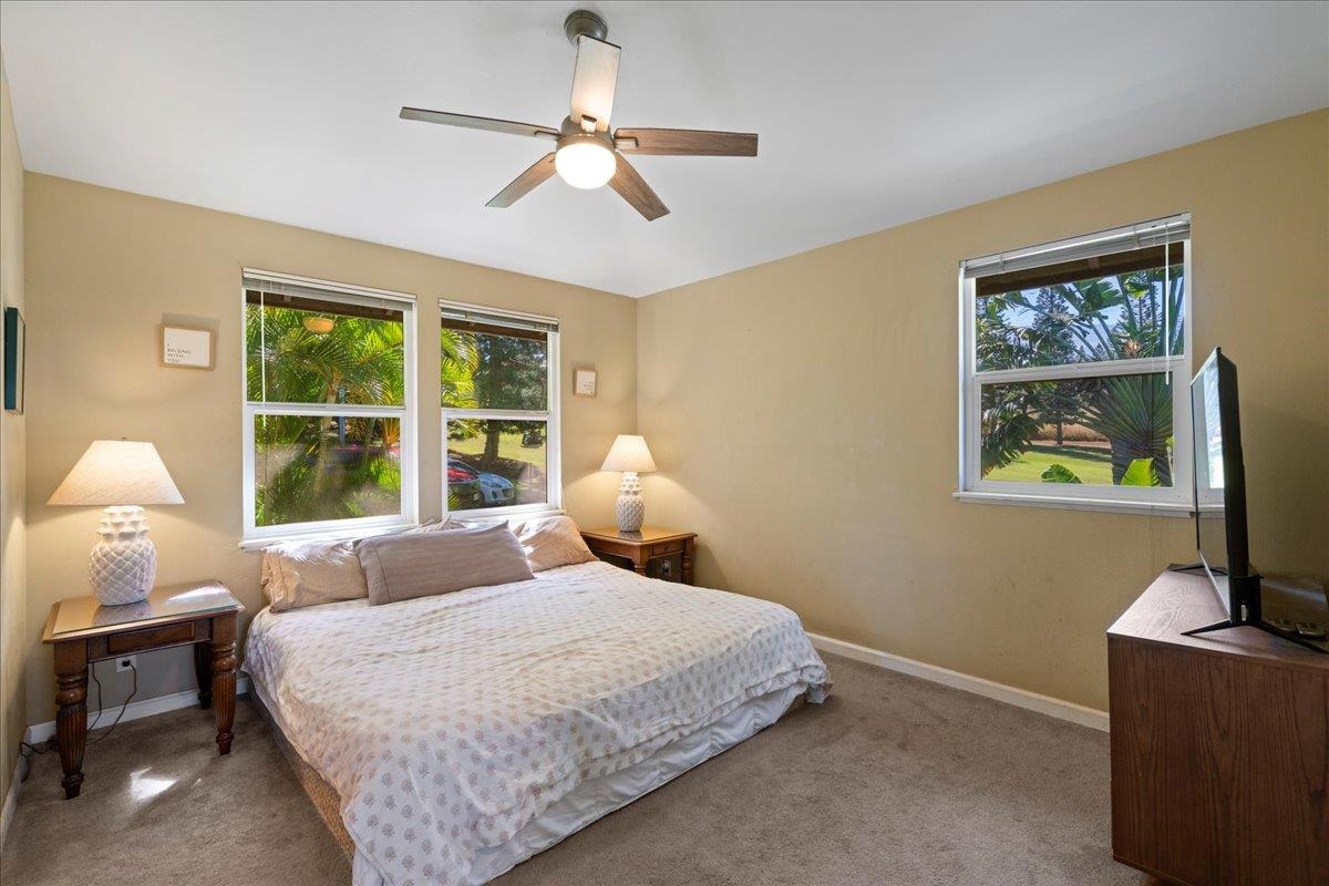 2740 Liholani Street, Unit 10 Pukalani, HI 96768 - Photo 35 of 50 a bedroom with a bed and a window