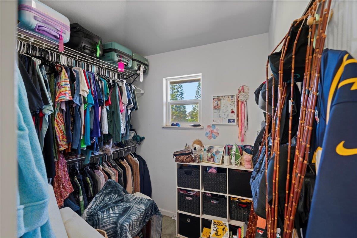 2740 Liholani Street, Unit 10 Pukalani, HI 96768 - Photo 39 of 50 a view of walk in closet with clothes and shoes