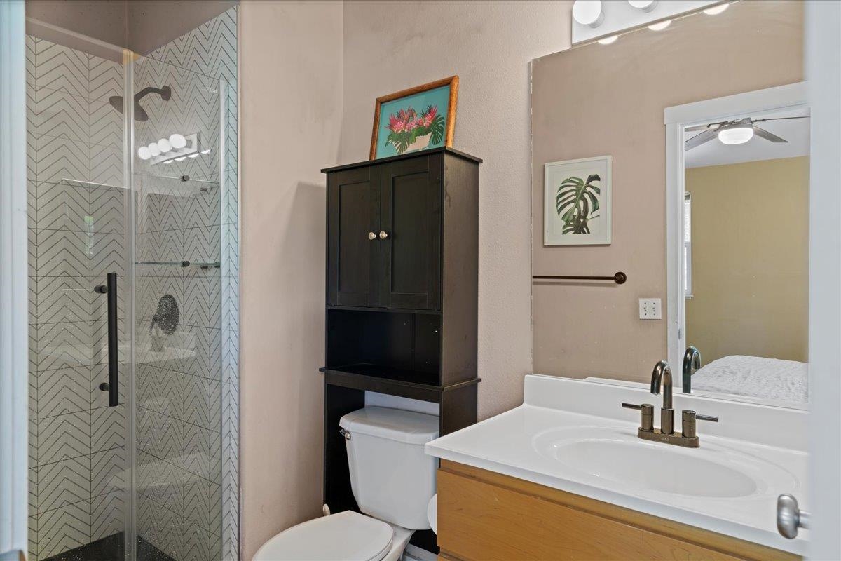 2740 Liholani Street, Unit 10 Pukalani, HI 96768 - Photo 41 of 50 a bathroom with a sink toilet and shower