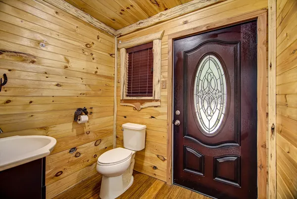 a bathroom with a toilet and a sink