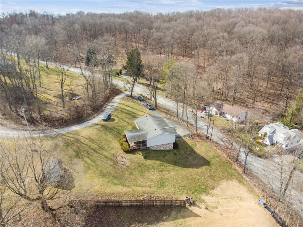 126 Wetzel Road Smock, PA 15480 - Photo 30 of 33 a view of a swimming pool with a yard
