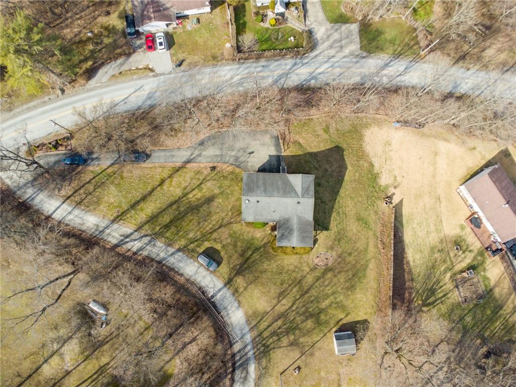 126 Wetzel Road Smock, PA 15480 - Photo 33 of 33 a aerial view of a house with a yard