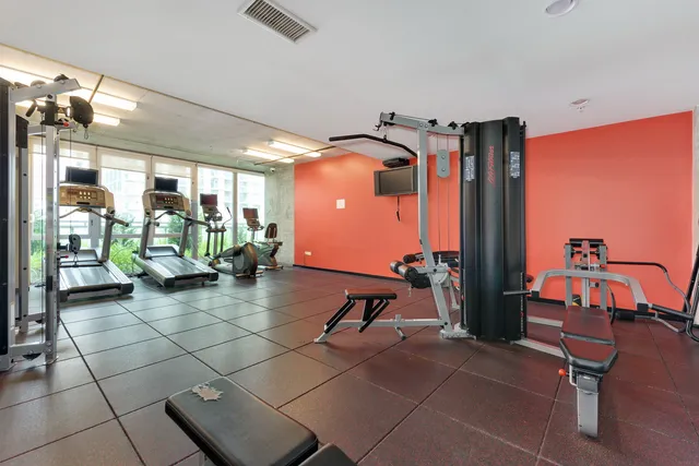 a view of a room with gym equipment