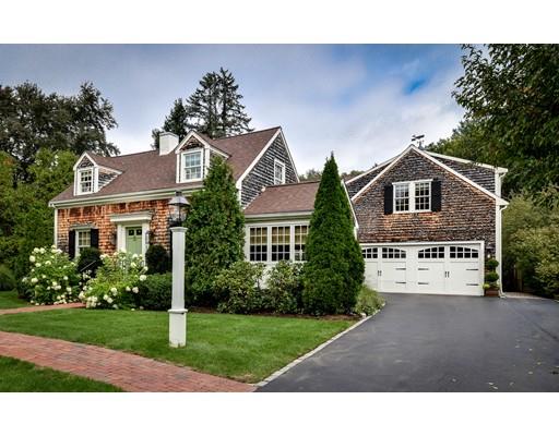 23 Bogle Street Weston, MA 02493 - Photo 1 of 23 a front view of a house with a yard and garage