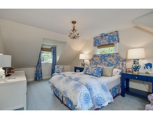 23 Bogle Street Weston, MA 02493 - Photo 19 of 23 a bedroom with a bed wooden floor and window