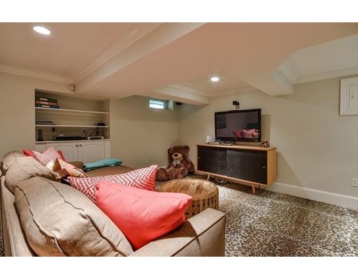 23 Bogle Street Weston, MA 02493 - Photo 20 of 23 a bedroom with a bed and a television