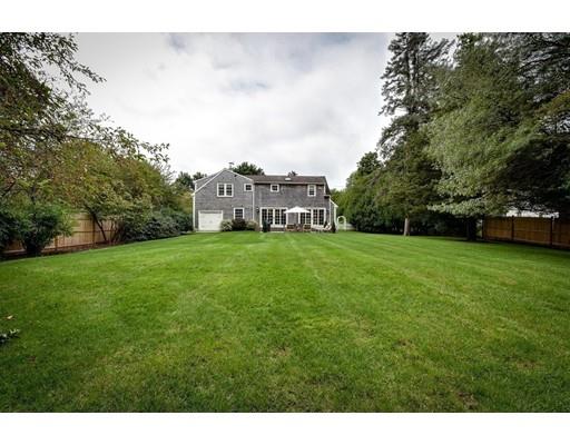 23 Bogle Street Weston, MA 02493 - Photo 23 of 23 a view of a house with a big yard and large trees