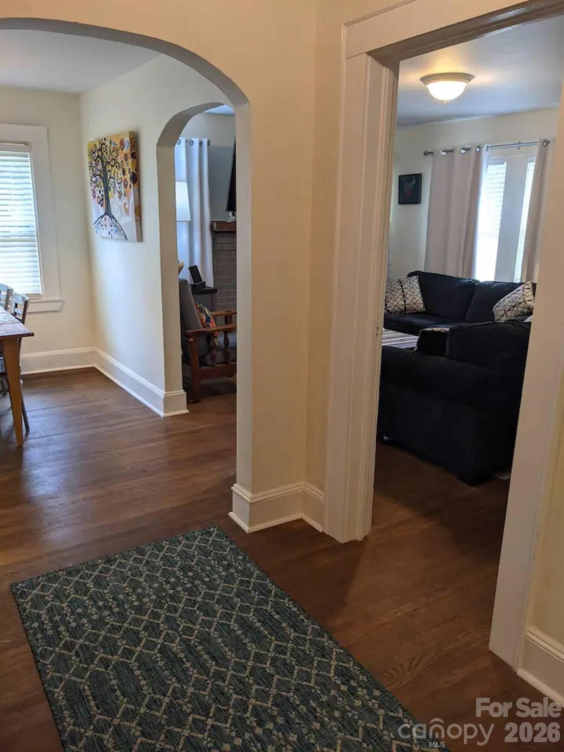4033 West Tyvola Road Charlotte, NC 28208 - Photo 16 of 48 a living room with wooden floor