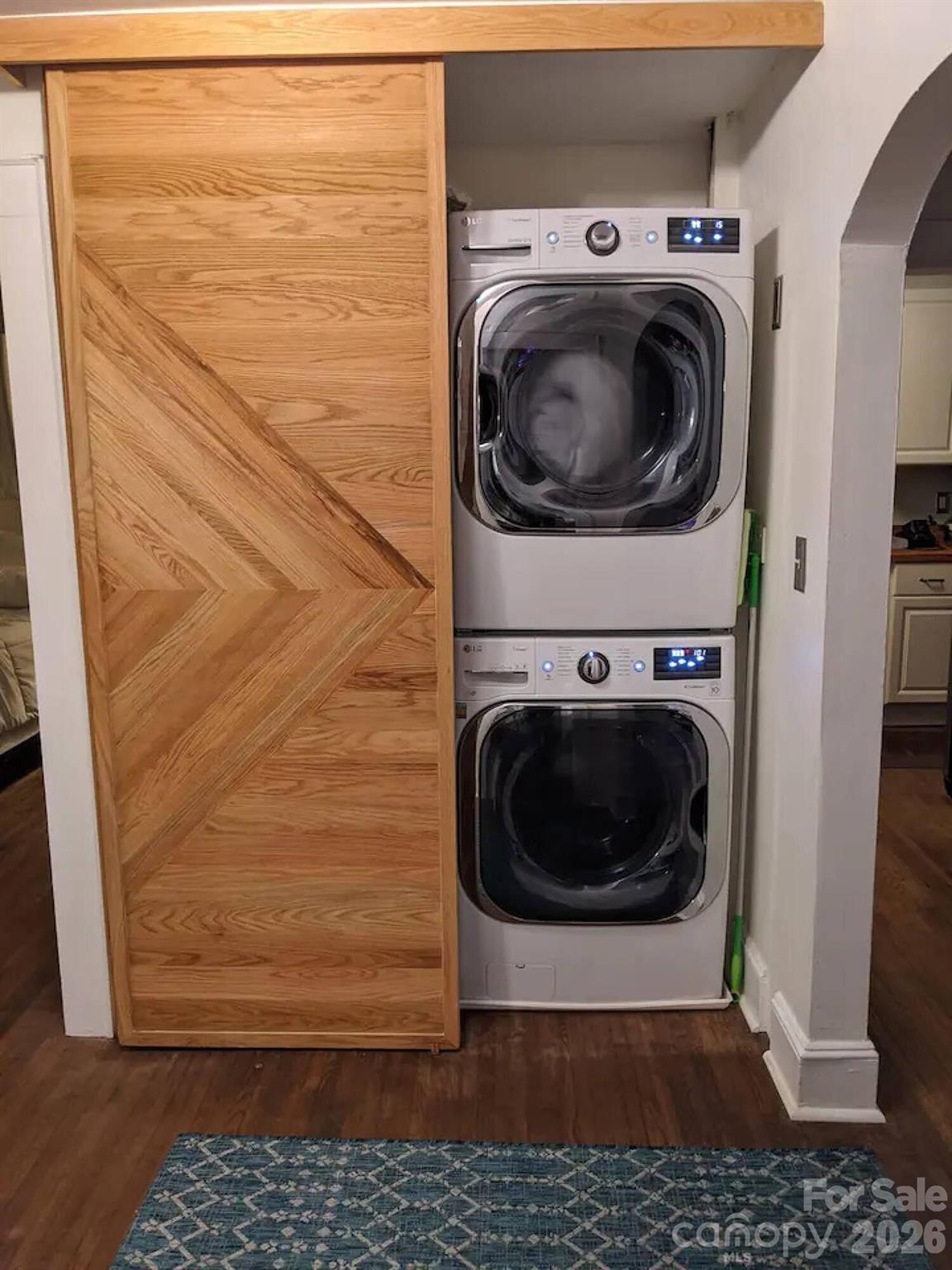 4033 West Tyvola Road Charlotte, NC 28208 - Photo 19 of 48 a view of a washer and dryer in a utility room