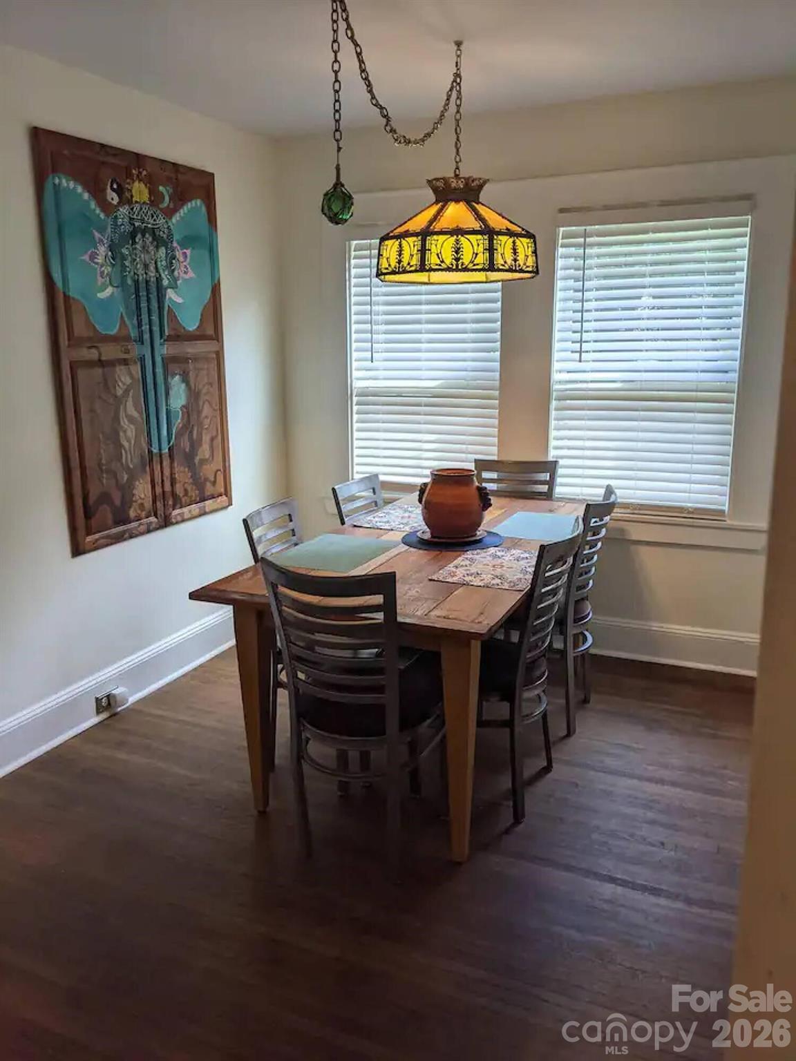 4033 West Tyvola Road Charlotte, NC 28208 - Photo 23 of 48 a view of a dining room with furniture window and wooden floor