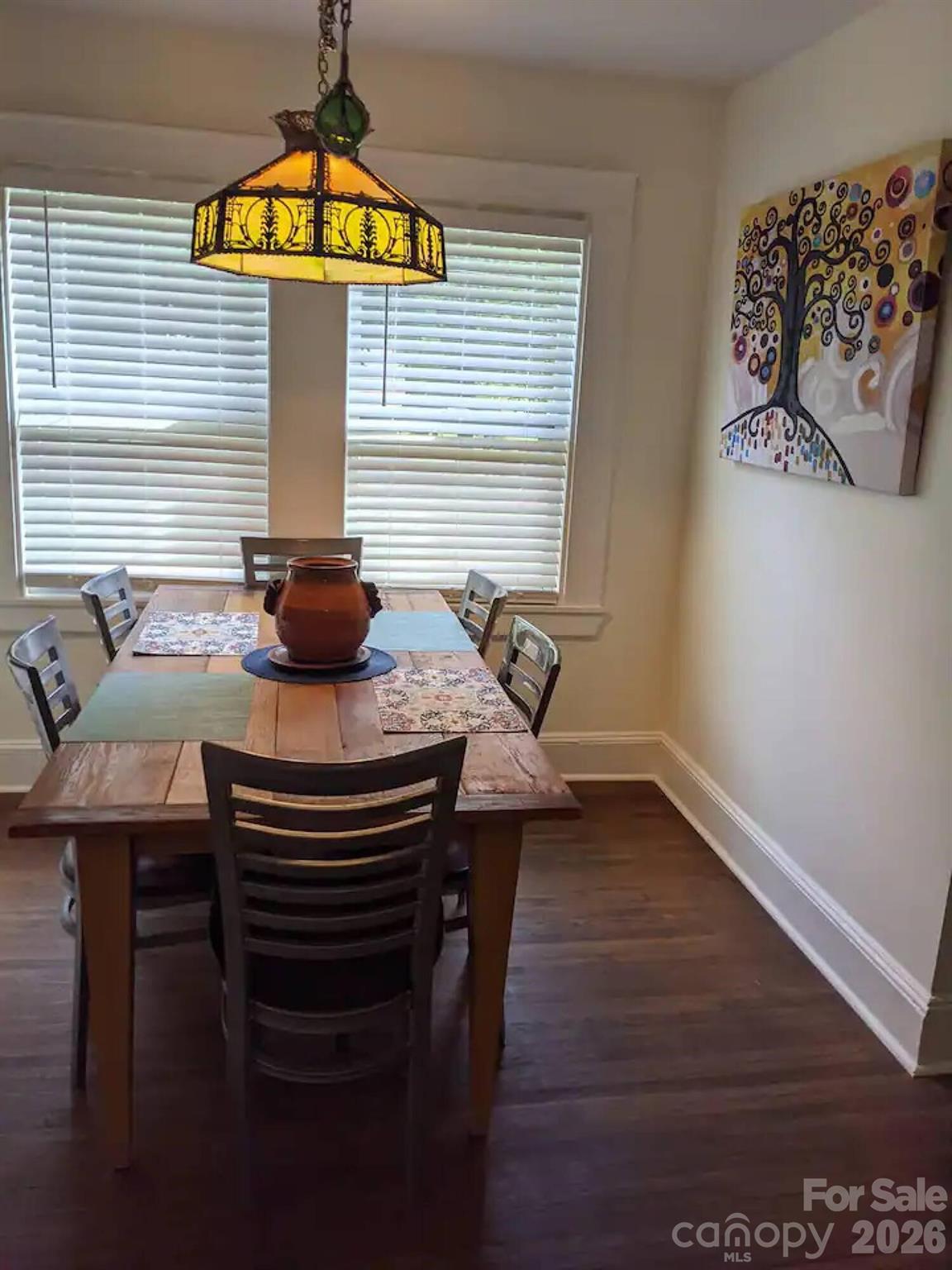 4033 West Tyvola Road Charlotte, NC 28208 - Photo 25 of 48 a kitchen with a table and a window