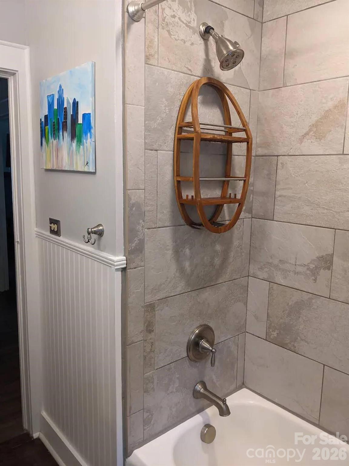 4033 West Tyvola Road Charlotte, NC 28208 - Photo 27 of 48 a bathroom with a sink and a mirror