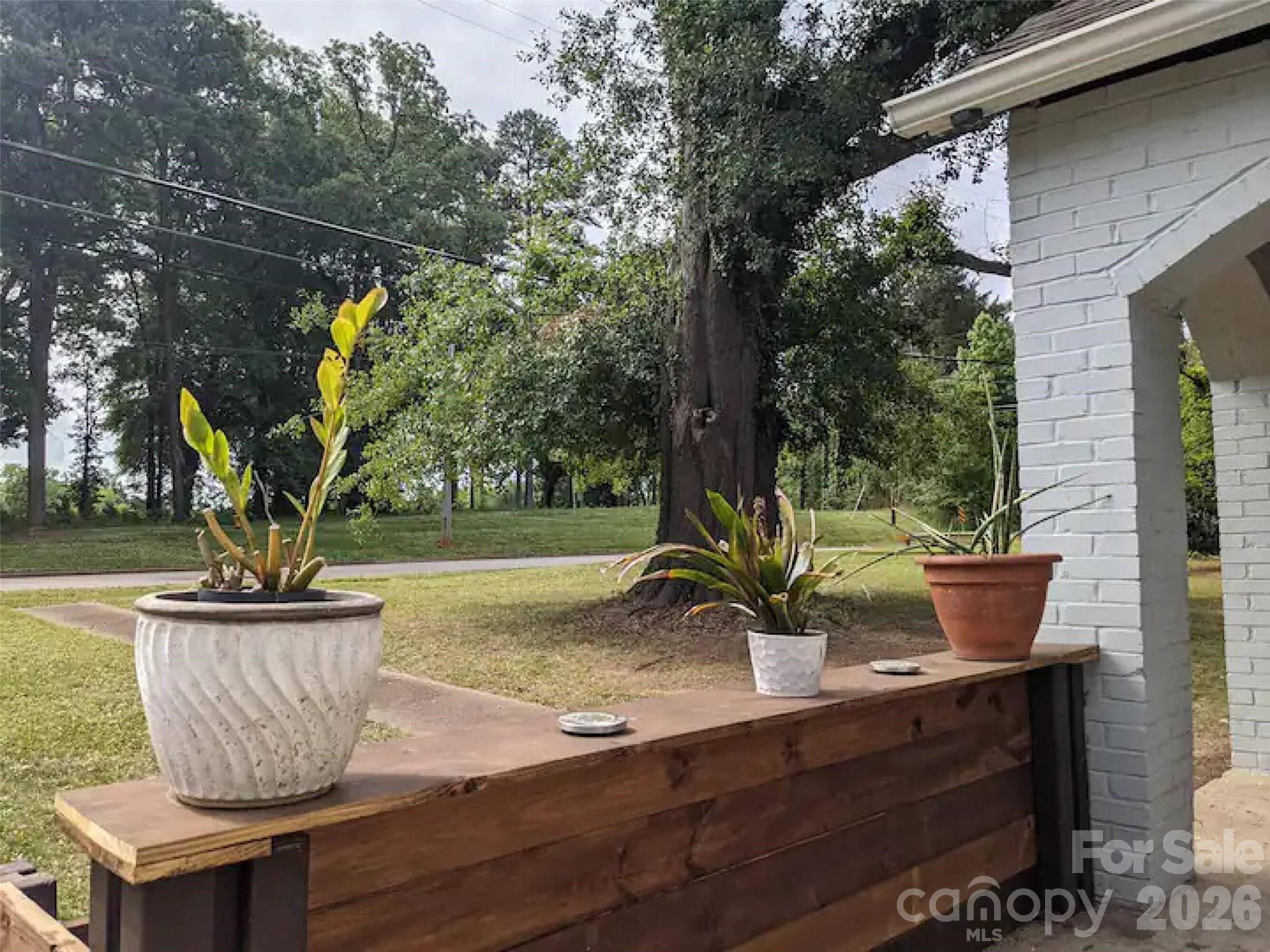 4033 West Tyvola Road Charlotte, NC 28208 - Photo 42 of 48 a view of outdoor space with water fountain
