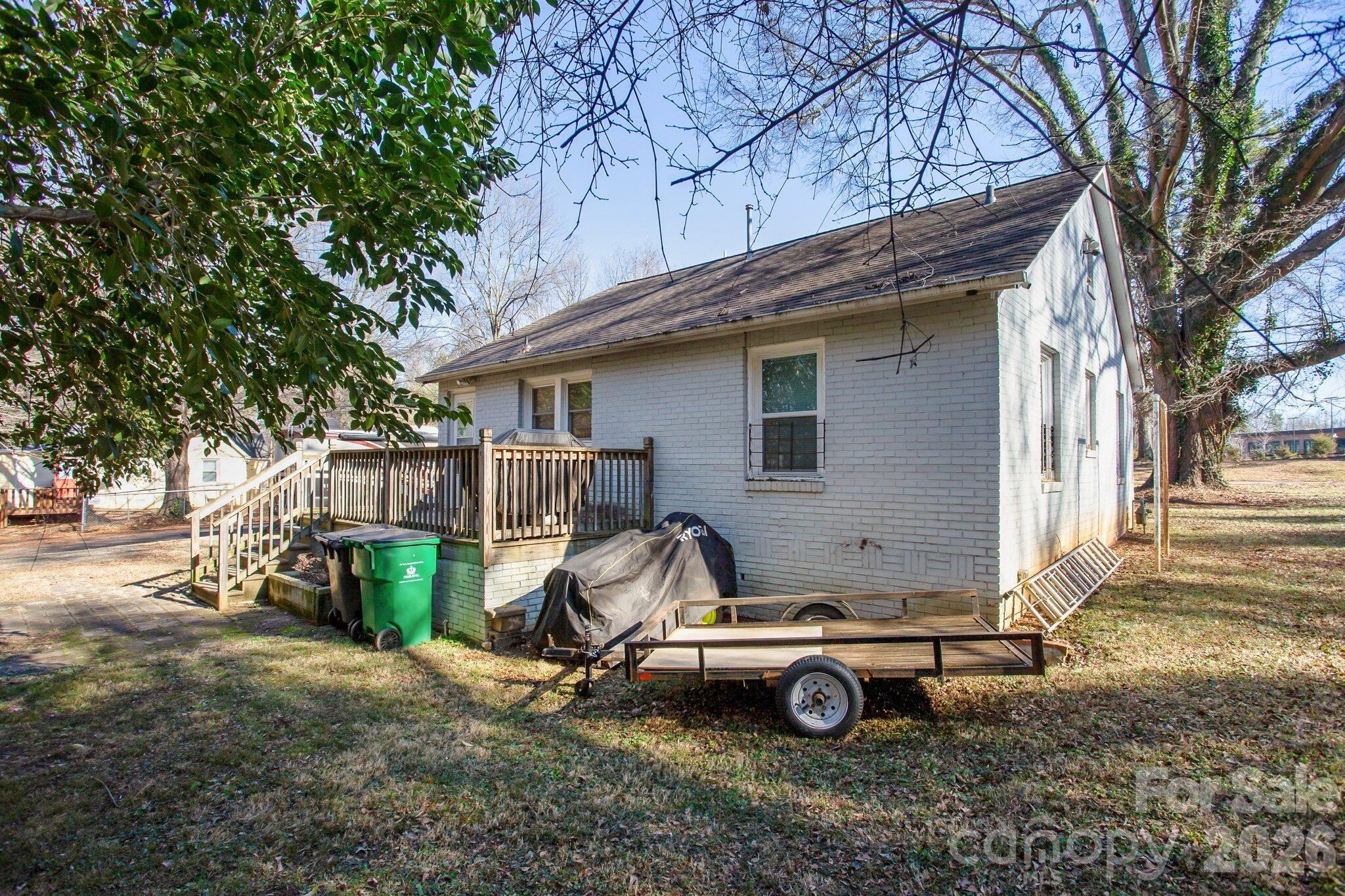 4033 West Tyvola Road Charlotte, NC 28208 - Photo 47 of 48 a car parked in front of a house