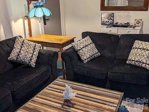 4033 West Tyvola Road Charlotte, NC 28208 - Photo 5 of 48 a bedroom with furniture and a bed