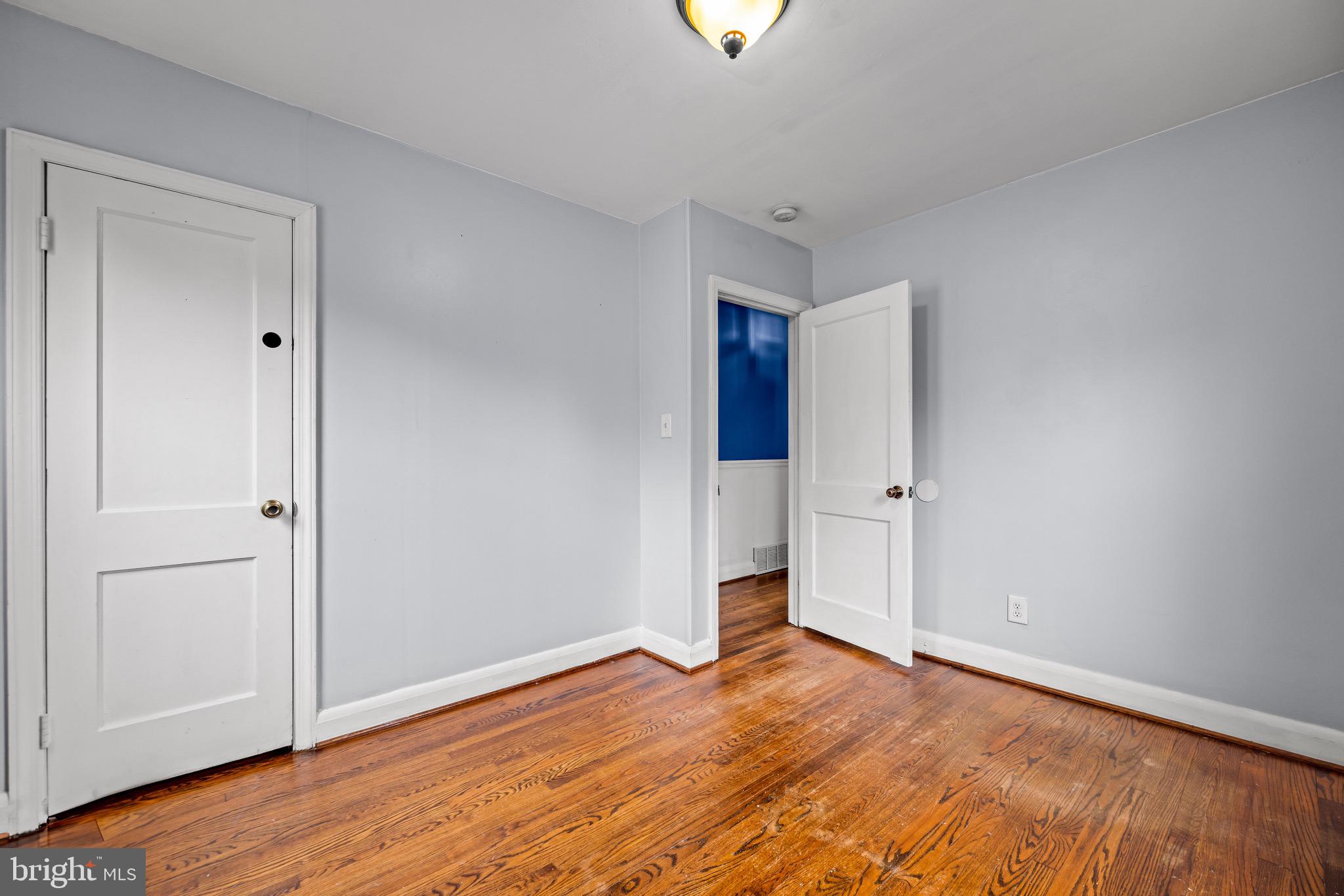 100 Prospect Road Glen Burnie, MD 21060 - Photo 16 of 26 a view of empty room with wooden floor