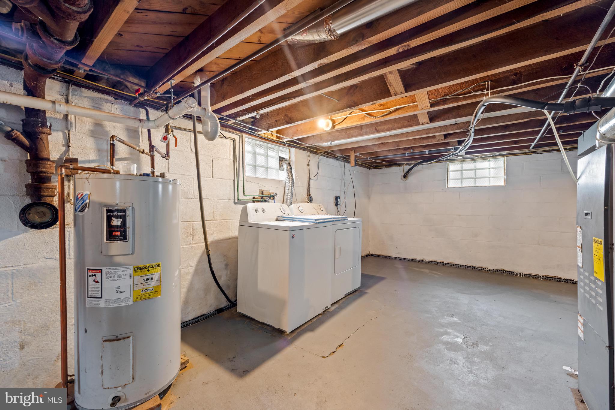 100 Prospect Road Glen Burnie, MD 21060 - Photo 19 of 26 a utility room with dryer and washer