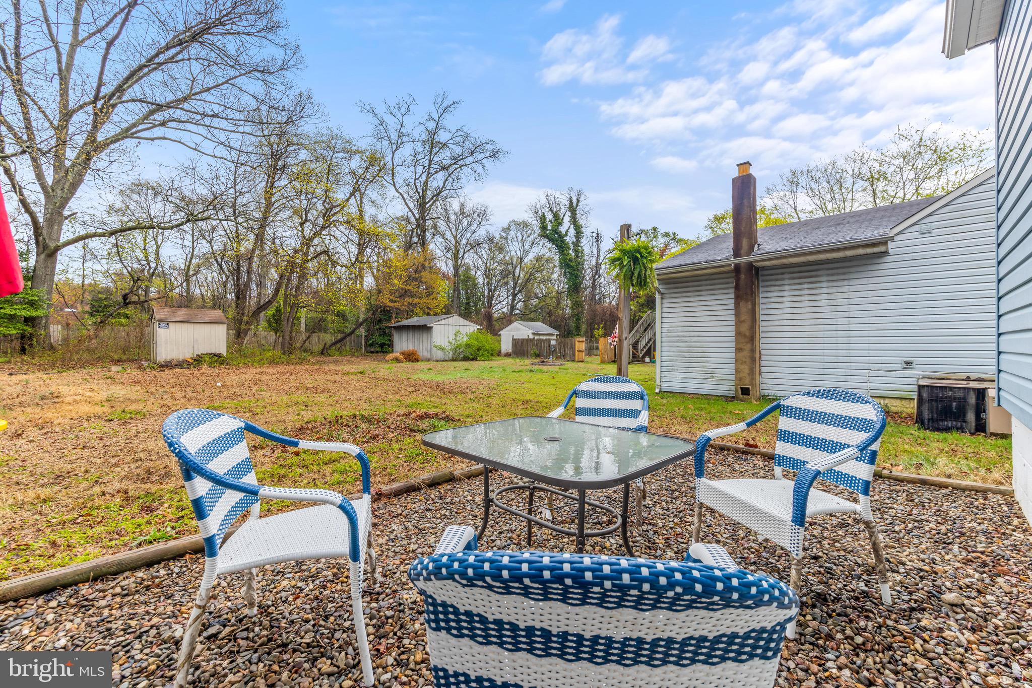 100 Prospect Road Glen Burnie, MD 21060 - Photo 22 of 26 a view of a swimming pool with a lounge chairs