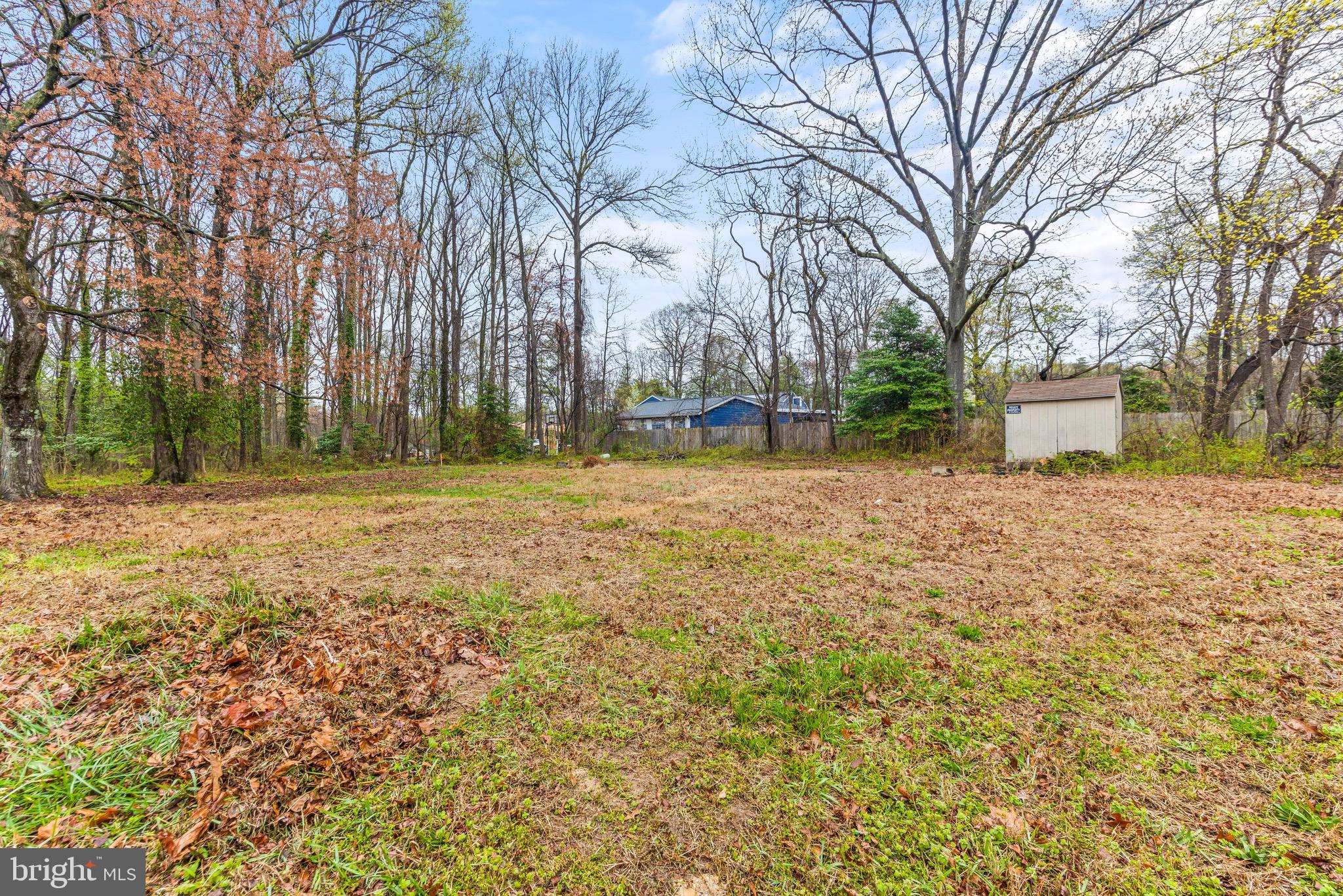 100 Prospect Road Glen Burnie, MD 21060 - Photo 24 of 26 a backyard of a house with large trees