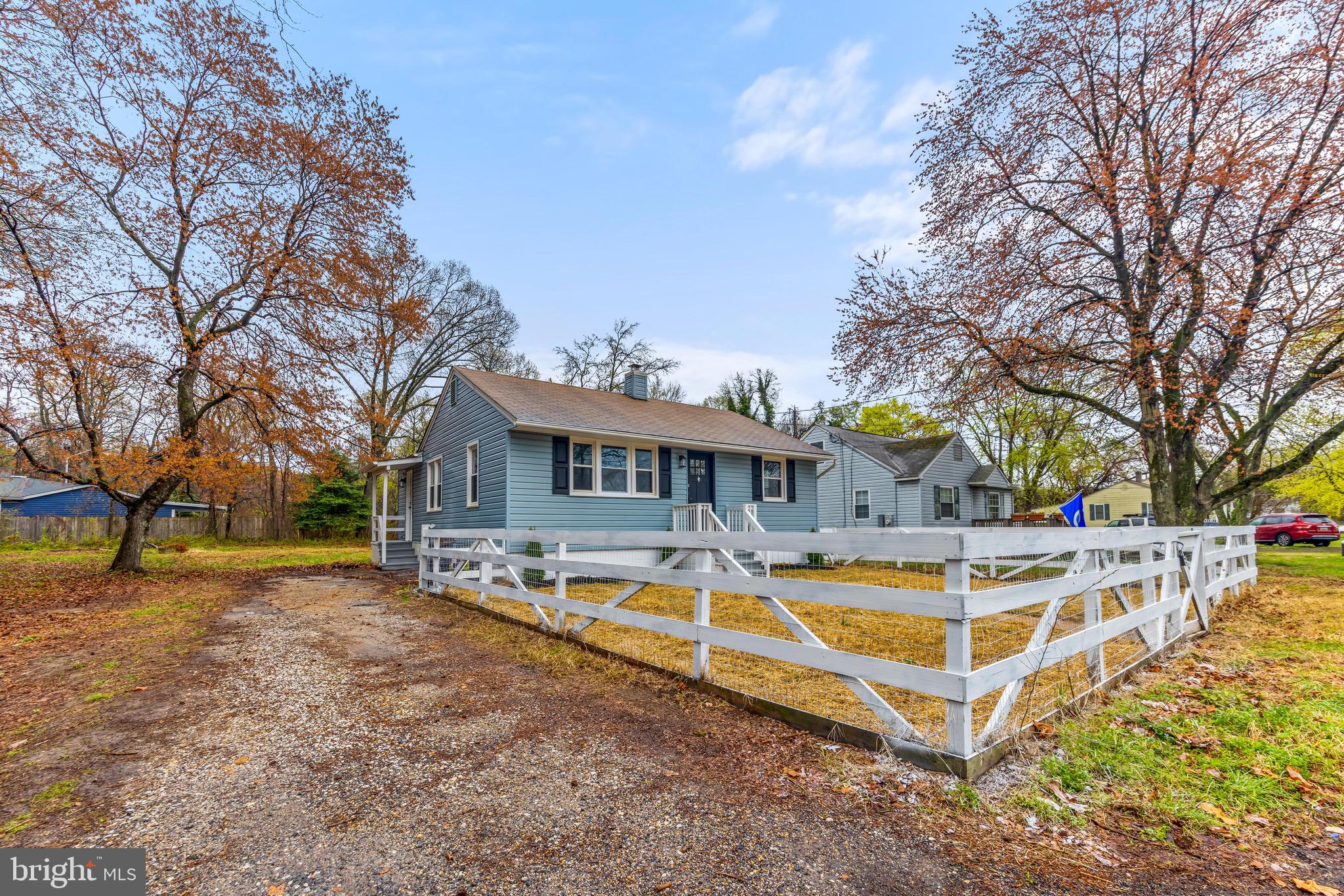 100 Prospect Road Glen Burnie, MD 21060 - Photo 25 of 26 a view of a house with a backyard and a tree