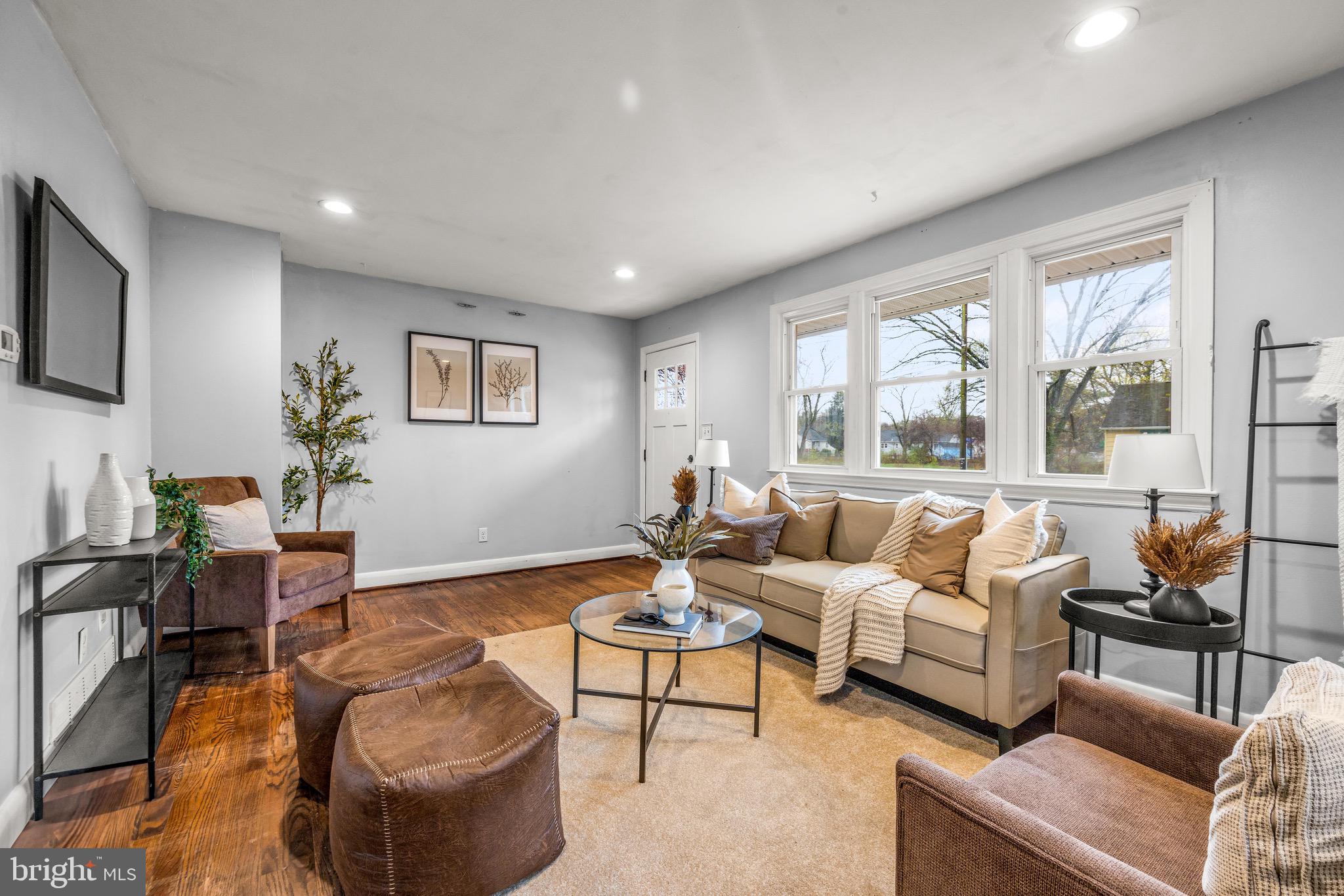 100 Prospect Road Glen Burnie, MD 21060 - Photo 3 of 26 a living room with furniture and a large window