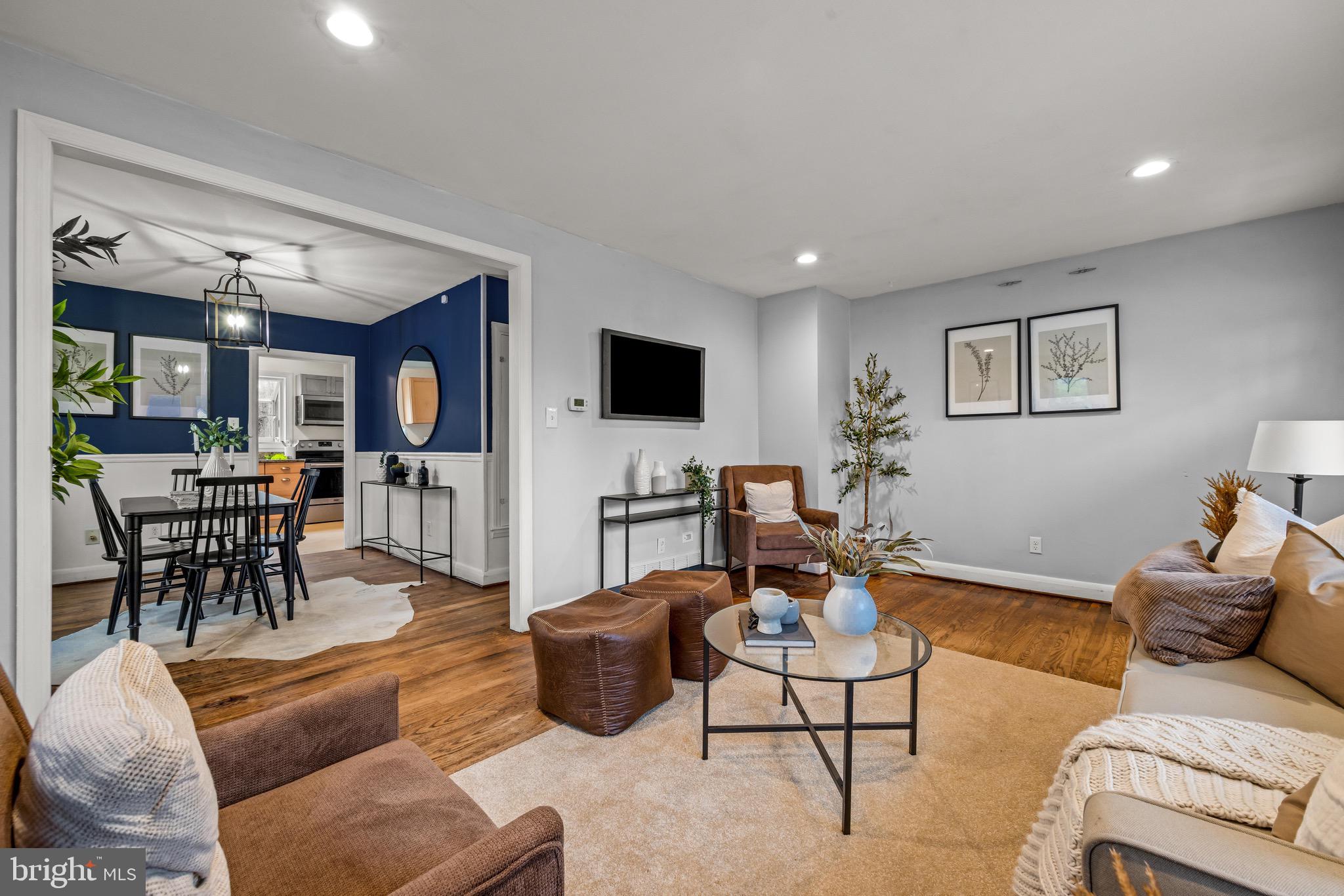 100 Prospect Road Glen Burnie, MD 21060 - Photo 5 of 26 a living room with furniture and a flat screen tv