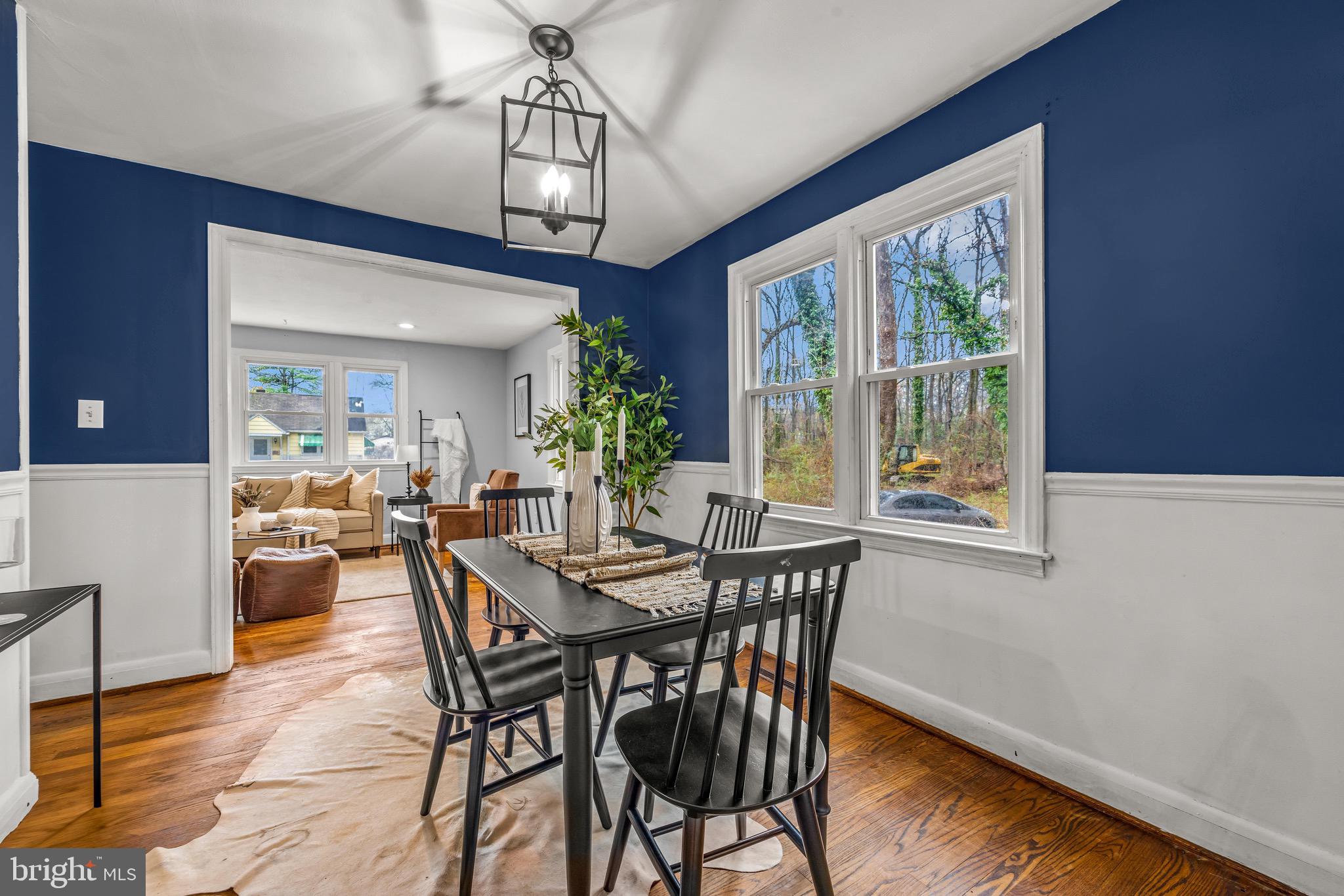 100 Prospect Road Glen Burnie, MD 21060 - Photo 8 of 26 a view of a dining room with furniture window and wooden floor