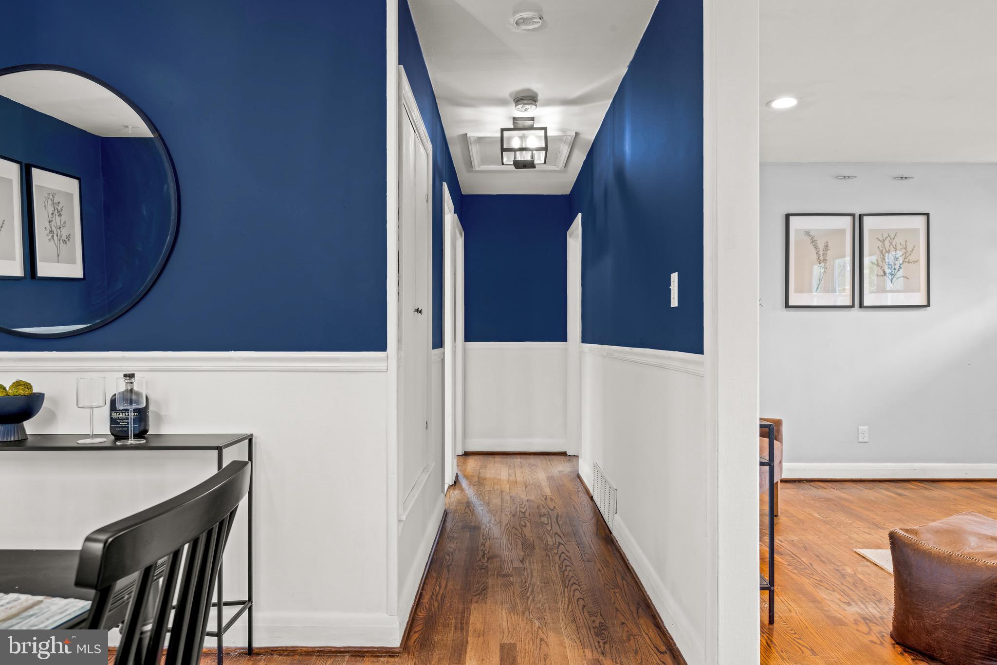 100 Prospect Road Glen Burnie, MD 21060 - Photo 9 of 26 a view of a hallway with entryway wooden floor and front door