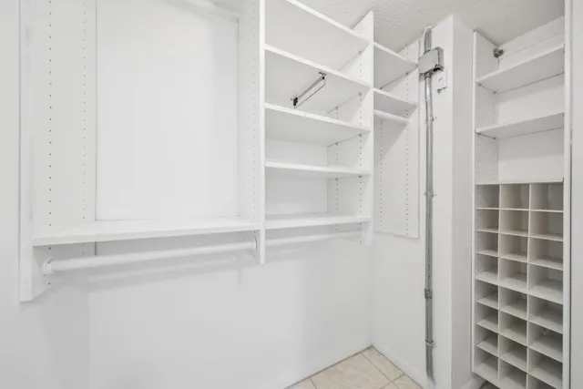 a view of an empty walk in closet