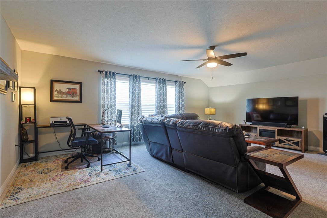 5013 Arena Court Hamilton, OH 45011 - Photo 27 of 41 This versatile bonus room offers comfortable living and a dedicated workspace for productivity.
