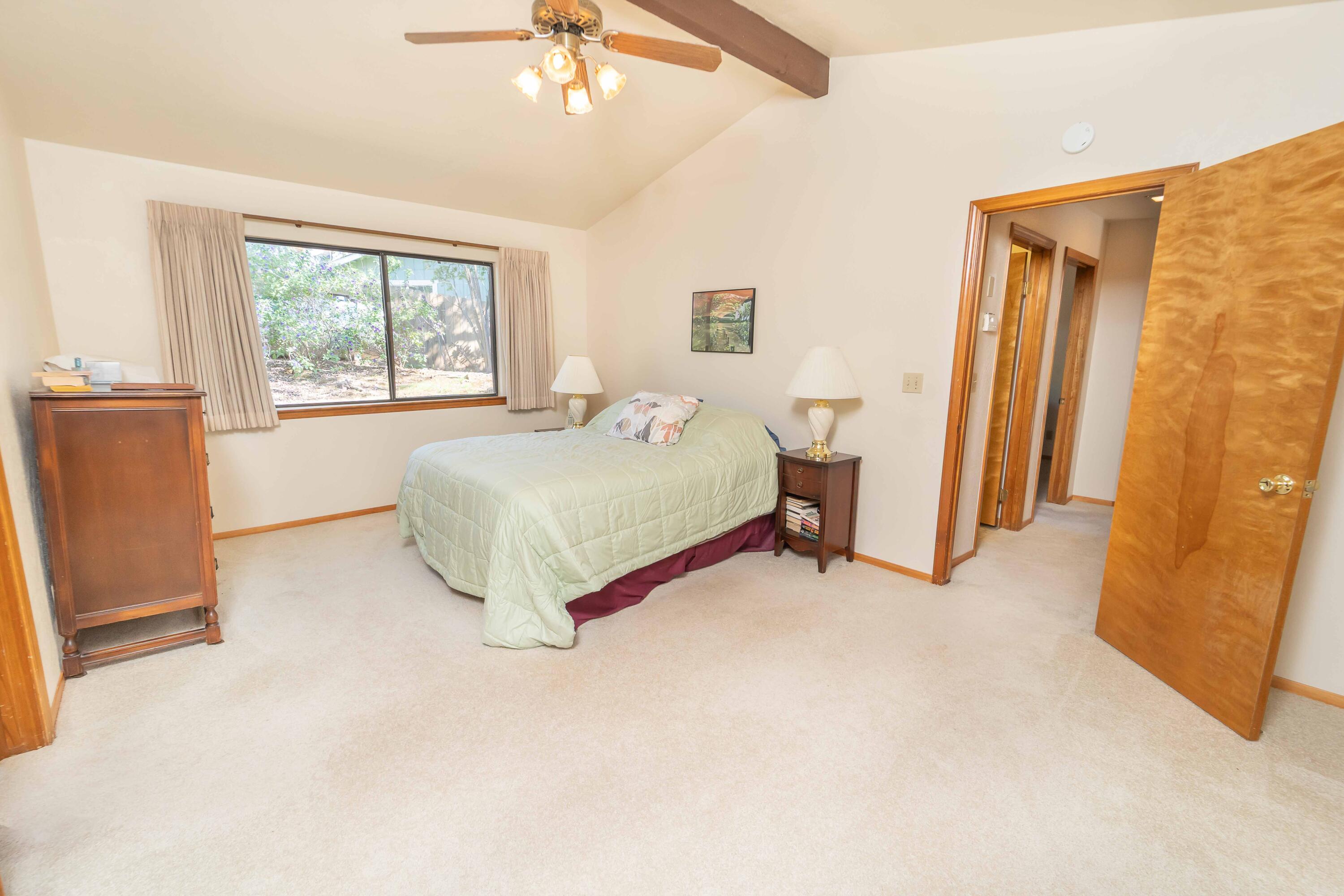 40962 Oak Ridge Drive Three Rivers, CA 93271 - Photo 22 of 36 a spacious bedroom with a bed and a window