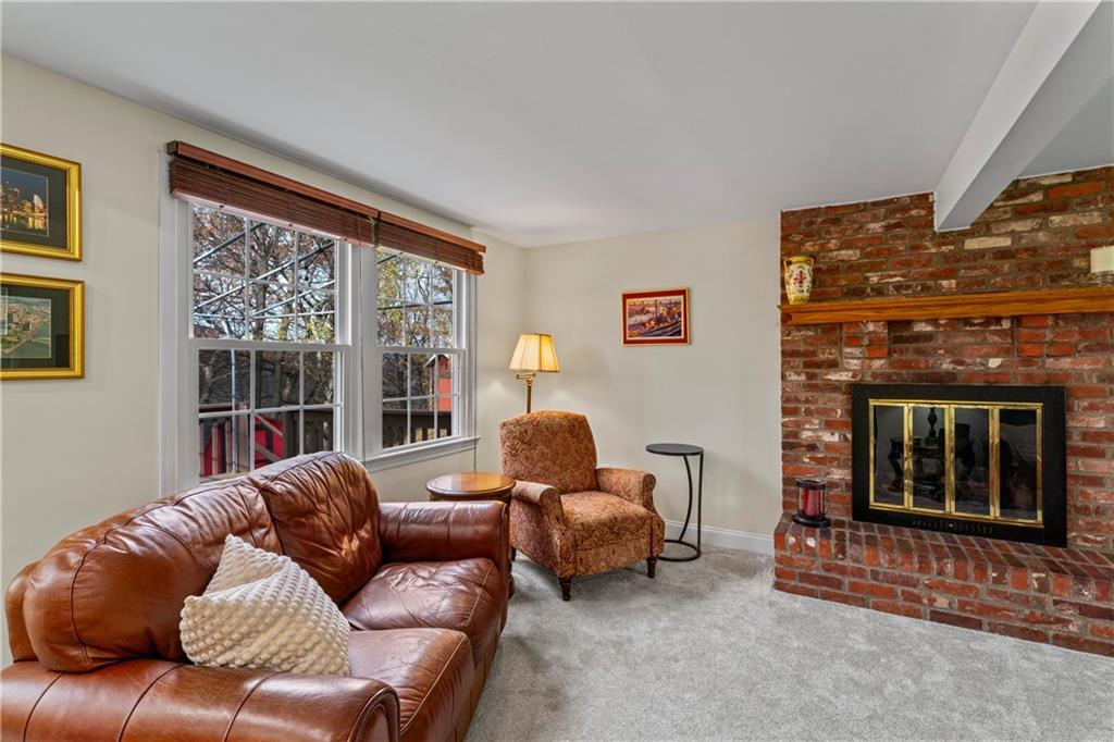 130 Tory Road Coraopolis, PA 15108 - Photo 11 of 50 a living room with furniture and a fireplace