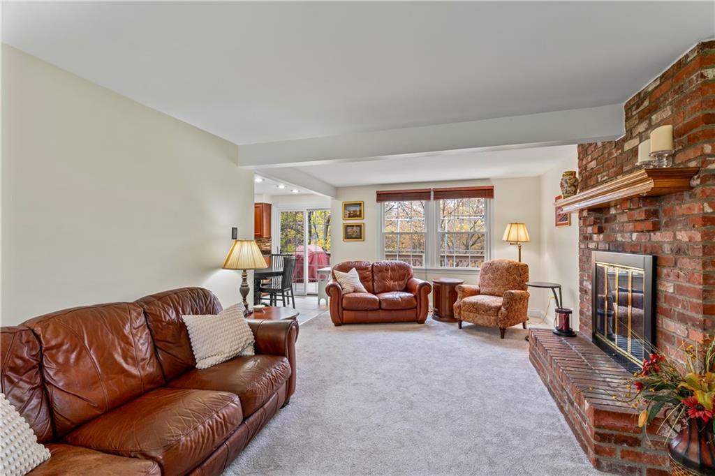130 Tory Road Coraopolis, PA 15108 - Photo 12 of 50 a living room with furniture fireplace and a window