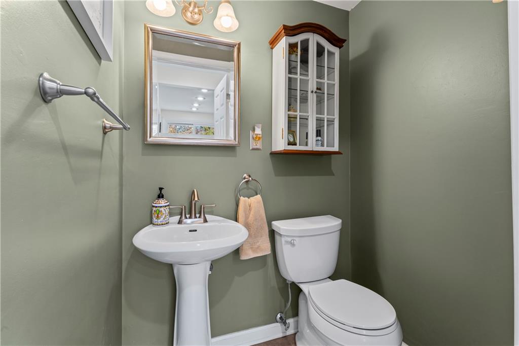 130 Tory Road Coraopolis, PA 15108 - Photo 14 of 50 a bathroom with a toilet sink and mirror