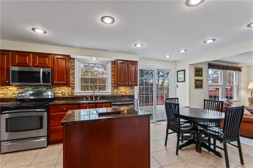 130 Tory Road Coraopolis, PA 15108 - Photo 16 of 50 a view of a dining room with furniture window and outside view
