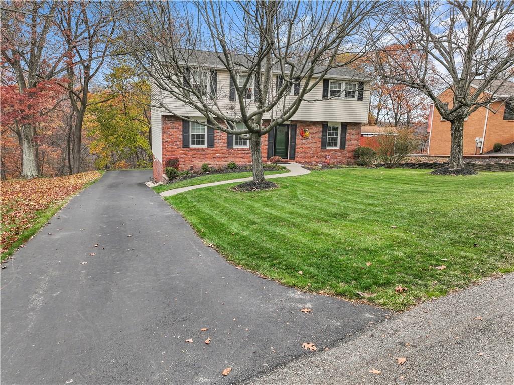 130 Tory Road Coraopolis, PA 15108 - Photo 2 of 50 a front view of a house with garden