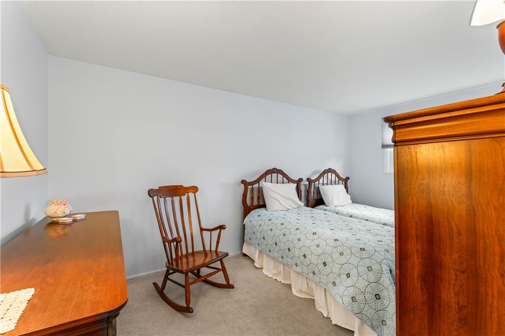 130 Tory Road Coraopolis, PA 15108 - Photo 30 of 50 a bedroom with a bed chair and two windows