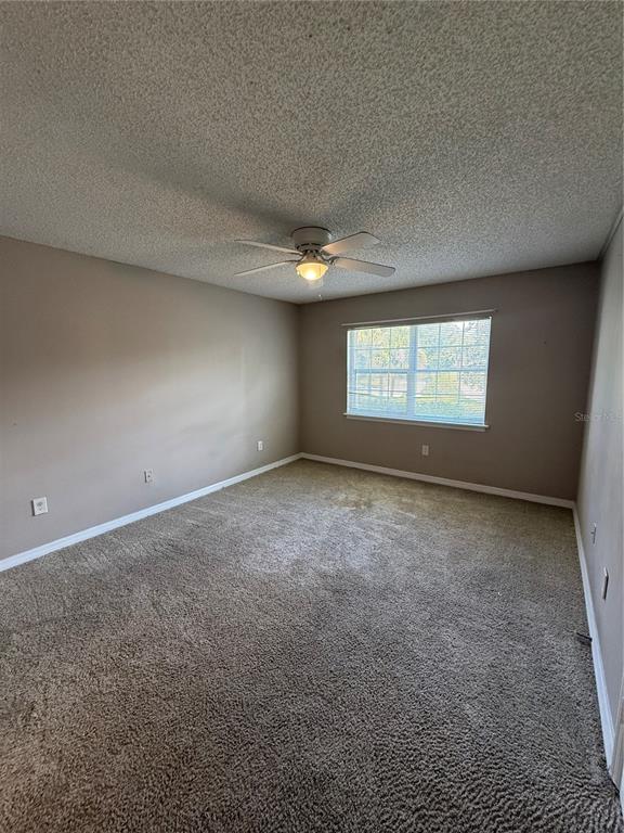 8209 Olympia Court Longwood, FL 32779 - Photo 17 of 29 an empty room with a window