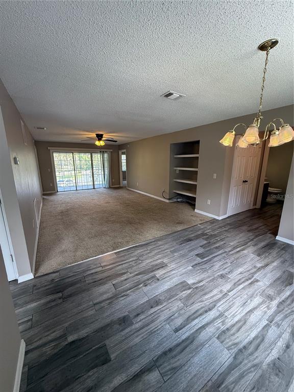 8209 Olympia Court Longwood, FL 32779 - Photo 20 of 29 a view of a livingroom with furniture and wooden floor