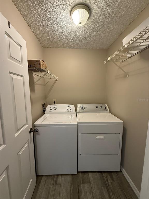 8209 Olympia Court Longwood, FL 32779 - Photo 22 of 29 a utility room with dryer and washer