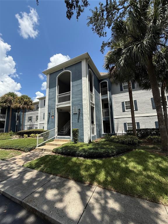 8209 Olympia Court Longwood, FL 32779 - Photo 29 of 29 a view of a house with a yard