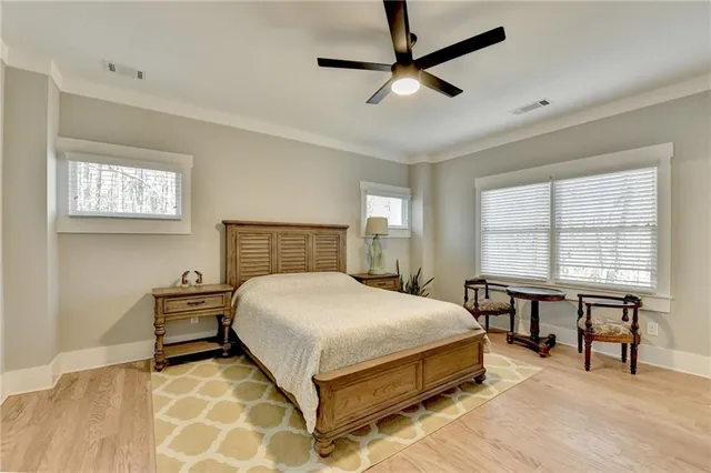 a bathroom with double vanity sinks and a mirror